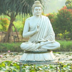 Meditative Buddha Statue in a Garden Pond A Serenity Symbol